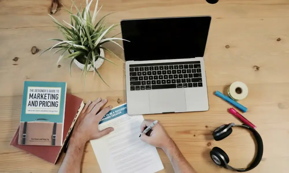 Marketing and promotional materials for a franchise on a table