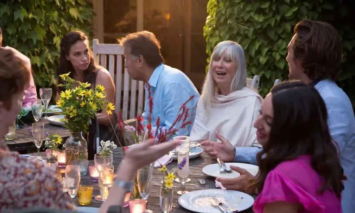 Colorful poke bowls and fresh summer sides on outdoor serving table