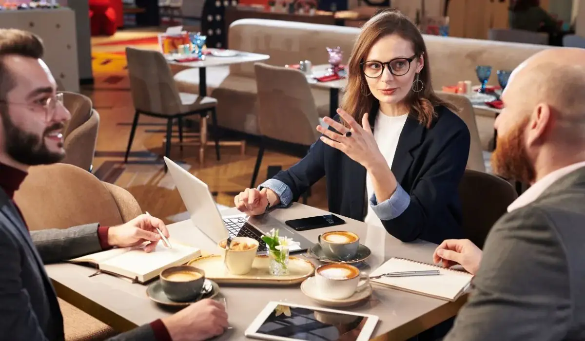Business meeting in restaurant discussing legal and relationship questions for Poke Bowl franchise