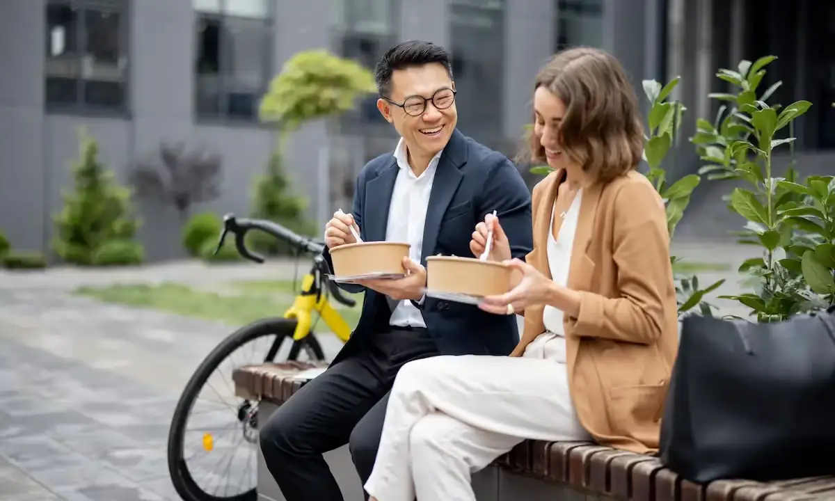 Person reviewing restaurant franchise documents at a table