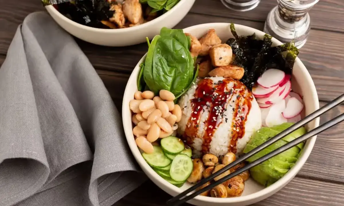 assorted poke bowls with varied sauces and fresh toppings